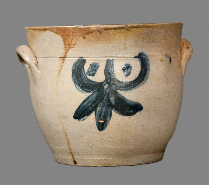 1 Gal. Cobalt Decorated Stoneware Crock, probably New J: One-Gallon Stoneware Jar with Cobalt Drape and Tassel Decoration, New Jersey origin, circa 1840, squat-shaped ovoid jar with tooled shoulder, tall collar, and applied lug handles. Decorated on one sid