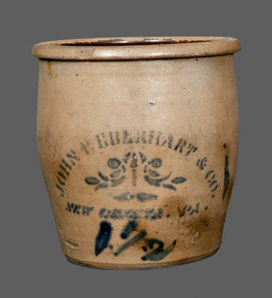 JOHN P. EBERHART & CO. / NEW GENEVA, PA Stoneware Cream: One-Gallon Stoneware Cream Jar, Stenciled "JOHN P. EBERHART & CO. / NEW GENEVA. PA," circa 1875, ovoid jar with flattened rim, decorated with a stenciled foliate design at the midsection and a freehan