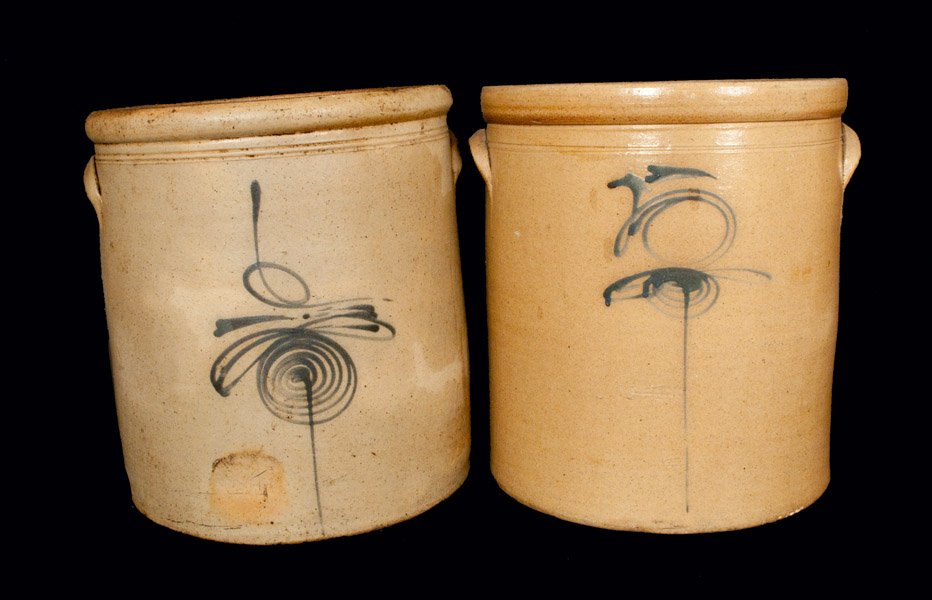 Lot of Two: Midwestern Stoneware Crocks with Bee Stinge: Two Midwestern Stoneware Crocks, fourth quarter 19th century, both of cylindrical form with tooled shoulder, rounded rim, and applied lug handles, one featuring a slip-trailed “6” underscored by a