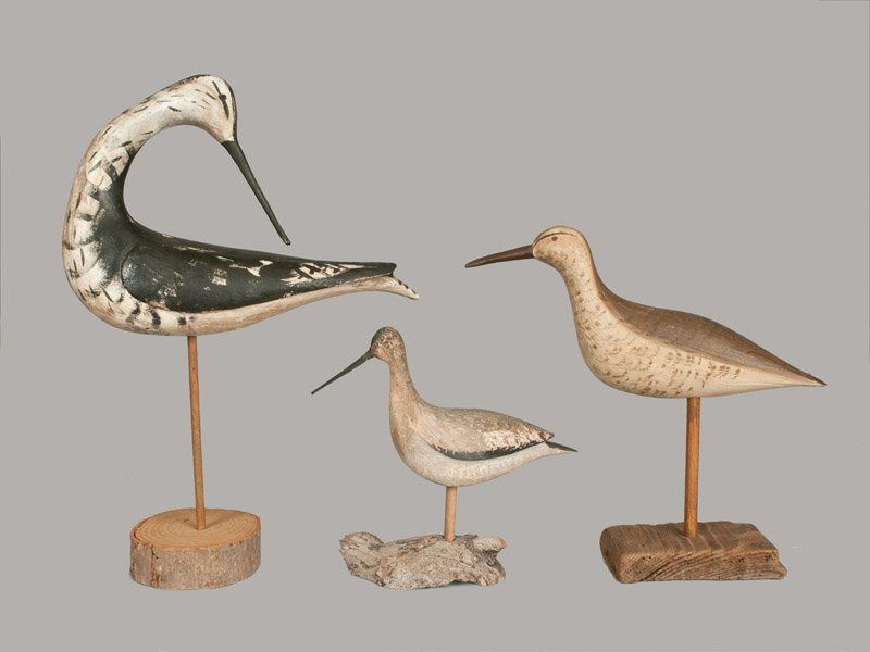 Three Shorebird Decoys: Three Carved and Painted Decorative Shorebird Decoys, late 20th century, one signed in ink on underside "SHORE BIRD / HAND CARVED By Jim White / CAIRO, GA /1981'; one in preening stance; and one small