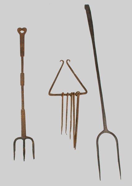 Lot of Three: Rare 18th Century Iron Skewer Set: Three Iron Cooking Utensils, 18th or early 19th century, an unusual set of five iron skewers with scrolled hanger; a flesh fork with scrolled, stylized heart handle; and a large flesh fork with curved