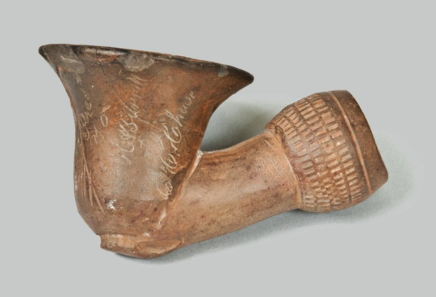Unusual 1854 Boston Redware Presentation Pipe: Unusual Boston Redware Presentation Pipe, Dated 1854, probably Boston, Massachusetts, origin, with coggled end molding and flared bowl, the surface with stylized incised tulip head and the incised ins