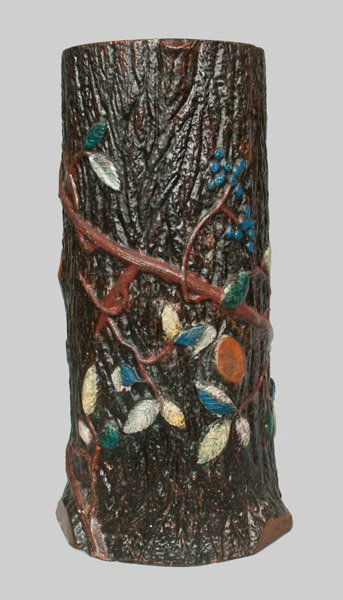 Rustic Redware Umbrella Stand: Rustic Redware Umbrella Stand, American, possibly J. Eberly & Co., Strasburg, VA, late 19th century, in the form of a tree stump encompassed by a leafy vine with berries. Old polychrome-painted exteri