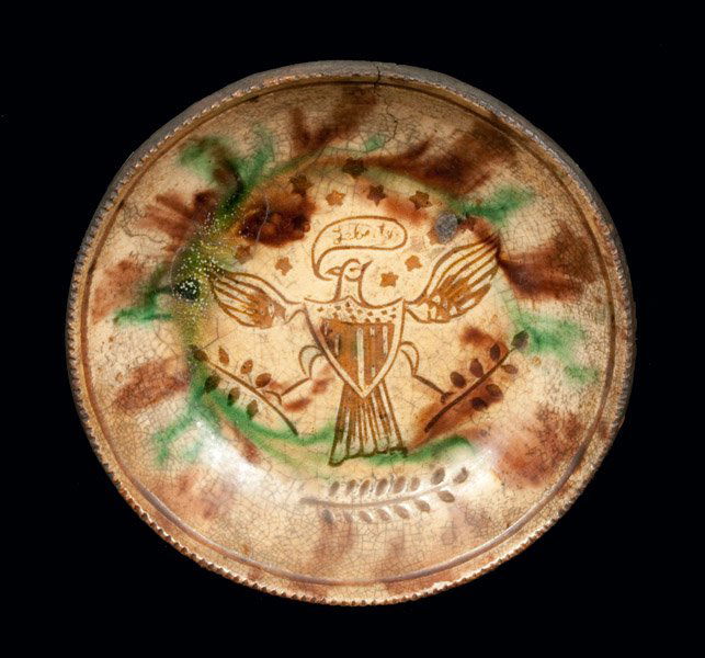 Fine Sgraffito Jacob Medinger Redware Plate with Eagle: Fine Sgraffito Redware Plate with Federal Eagle Decoration, attributed to Jacob Medinger, Limerick Township, Montgomery County, PA, late 19th or early 20th century, featuring a Federal eagle holding o