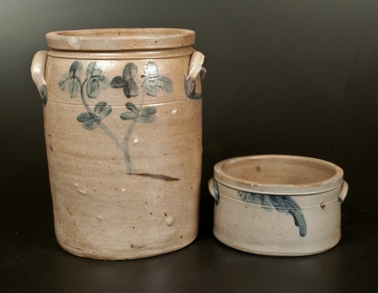 Lot of Two: 3 Gal. Baltimore Stoneware Crock and: Two Pieces of Baltimore, MD Stoneware with Cobalt Decoration, circa 1875, a three-gallon cylindrical crock with applied lug handles, decorated with a two-stemmed clover plant design on the front and r