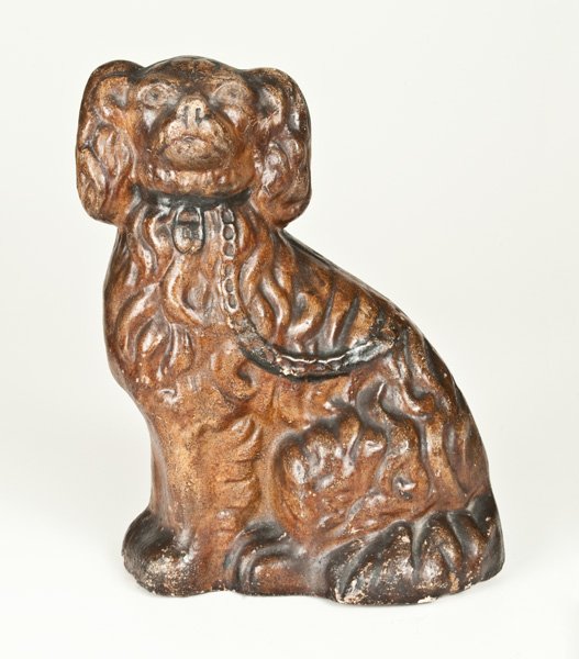 Rare Painted Sewertile Seated Spaniel Figure: Rare Painted Sewertile Figure of a Spaniel, attributed to Alfred Marsh, Walker Sewer Tile Plant, East Liverpool, Ohio, early 20th century, molded figure of a seated spaniel, the surface painted amber 