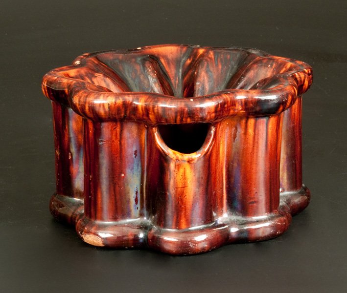 JOHN W. BELL / WAYNESBORO, PA Redware Molded Spittoon: Molded Redware Spittoon, Stamped "JOHN W. BELL / WAYNESBORO, Pa," circa 1880, molded in a scallop-edged form with rounded base and rim moldings, the surface covered in a streaky manganese glaze over a