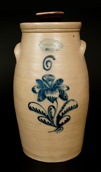 BURGER BROS & CO. / ROCHESTER, NY 6 Gal. Stoneware: Six-Gallon Stoneware Churn with Cobalt Floral Decoration, Stamped "BURGER BROS & CO. / ROCHESTER N.Y.," circa 1870, ovoid churn with applied lug handles and tooling to shoulder and rim, the front deco