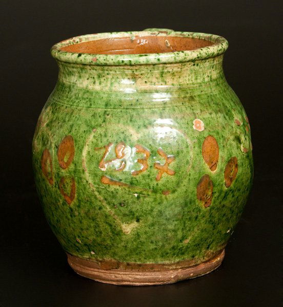 Redware Jar with Copper and Lead-Oxide Glaze Dated 1837: Green-Glazed Redware Jar with 1837 Date Within a Heart, possibly Pennsylvania or New England origin, ovoid jar with footed base and applied strap handle, the surface covered in a bright-green copper g