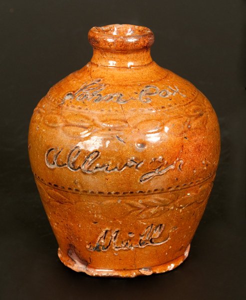 Very Unusual Small English Redware Jug Inscribed "John: Rare Glazed Redware Jug with Coggled Decoration, Incised "John Cox / Alburgh / Mill," English, 19th century, small-sized, ovoid jug with footed base, rounded spout, and coggled vine decoration in two