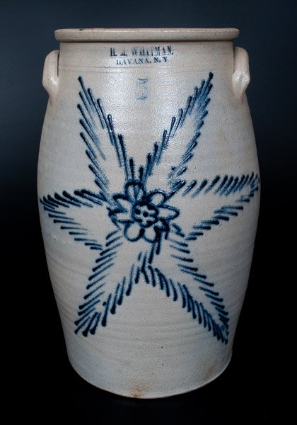 H. M. WHITMAN / HAVANA, NY Stoneware Churn with Very: Rare Five-Gallon Stoneware Churn with Cobalt Starburst Decoration, Stamped "H.M. WHITMAN / HAVANA, NY," circa 1860-1862, ovoid churn with tooled shoulder, semi-squared rim, and applied lug handles, de