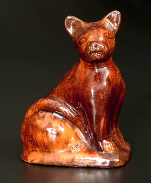 Very Rare Glazed Redware Cat Figure att. John Bell,: Very Rare Lead-and-Manganese-Glazed Redware Figure of a Cat, attributed to John Bell, Waynesboro, PA, circa 1850-1880, molded figure of a seated cat on an oblong base with incised details to eyes, muz