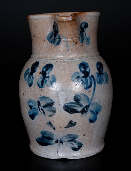 One-Gallon Baltimore Stoneware Pitcher: One-Gallon Stoneware Pitcher with Cobalt Floral Decoration, Baltimore, MD origin, circa 1870, ovoid pitcher with tooled collar, the front decorated with a two-stemmed clover plant design. Additional c