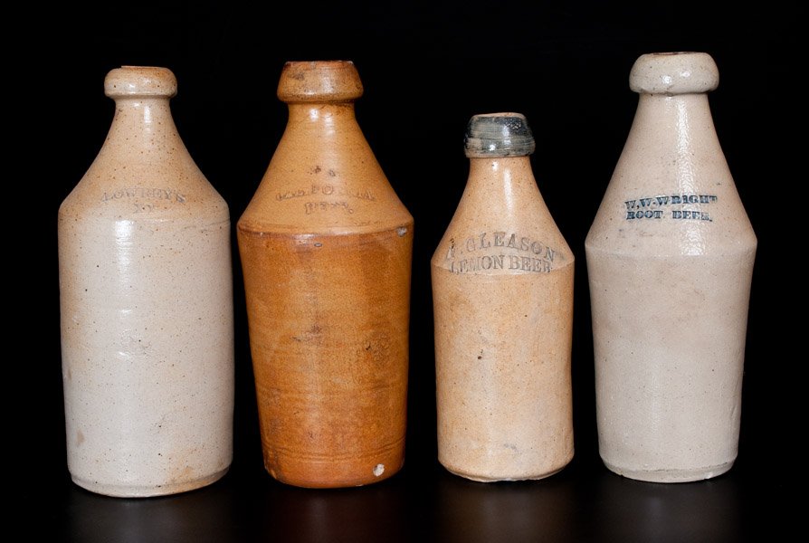 Lot of Four: Stoneware Beer Bottles incl. F. GLEASON /: Four Stoneware Beer Bottles, American, 19th century, one with cobalt-decorated top, stamped "F. GLEASON / LEMON BEER"; one with the cobalt-decorated mark, "W,W. WRIGHT / ROOT BEER"; one impressed "NOR