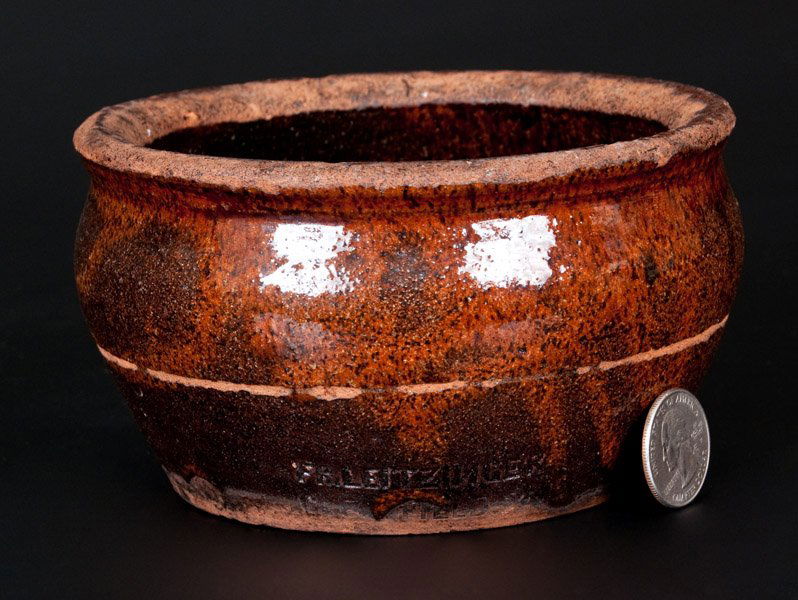 Rare FR. LEITZINGER / CLEARFIELD, PA Glazed Redware: Rare Diminutive Glazed Redware Jar, Stamped "FR. LEITZINGER / CLEARFIELD, PA," circa 1851-1879, small-sized, bowl-shaped jar with mottled red and brown lead-and-manganese glaze, impressed at the base