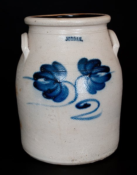 Rare JORDAN (NY) Stoneware Jar with Cobalt Floral: Rare Two-Gallon Stoneware Jar with Cobalt Floral Decoration, Stamped "JORDAN," New York State origin, third quarter 19th century, semi-ovoid jar with tooled accents, flared rim, and applied lug handle
