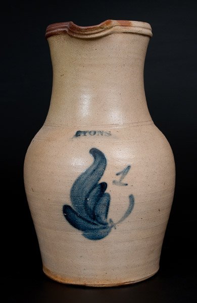 LYONS, New York Stoneware Pitcher with Cobalt Floral: One-Gallon Stoneware Pitcher with Cobalt Foliate Decoration, Stamped "LYONS," Thompson Harrington, Lyons, NY, circa 1860, ovoid pitcher with tooled midsection and tall collar with stepped rim, the pit