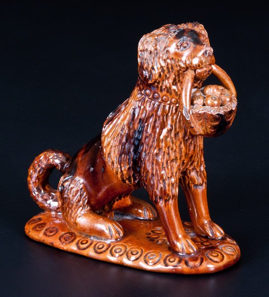 Glazed Pennsylvania Redware Figure of a Dog with Basket (1 of 10)