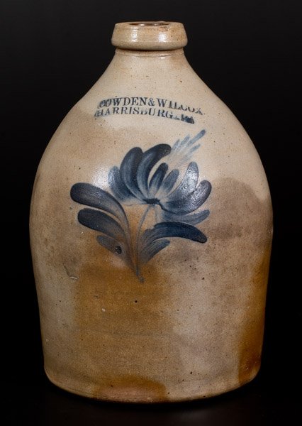 COWDEN & WILCOX / HARRISBURG, PA Stoneware Jug w/: One-Gallon Stoneware Jug with Cobalt Floral Decoration, Stamped "COWDEN & WILCOX / HARRISBURG, PA", circa 1865, ovoid jug with tooled shoulder and tapered spout, decorated with a brushed cobalt tulip.