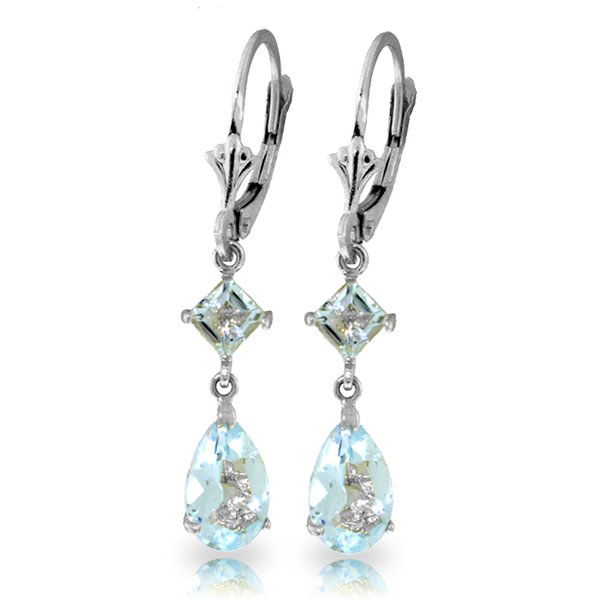 Aquamarine Long Drop Earrings in 14k White Gold: The light blue hues of aquamarine gemstones add soft and subtle elegance to any jewelry that they adorn. These 14k solid gold leverback earrings with aquamarine stones look as heavenly as a clear blue