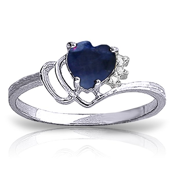 14K White Gold Love Sweetens Life Sapphire Diamond Ring: 14K White Gold Love Sweetens Life Sapphire Diamond Ring **|**|** Original Ring size 7.0 A heart shaped Sapphire matched with three glistening Diamonds are set in this 14k White Gold Band. The band is