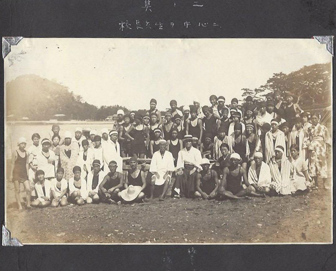 Group of Japanese Photographs, ca. 1920.: A group of nine (9) album photographs with depictions of Japanese men and women in bathing suits, school uniforms, and in front of a church. Medium: Silver print. Measurements: 7 3/4 x 10 1/8