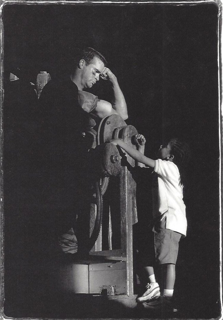 Three Photographs of Man, Child, and Machine: Three (3) black and white photographs: of man, child and machine; of Henry Rollins and machine; and of Henry Rollins, child and machine. Medium: Silver prints. Measurements: 6 3/4 x 9 3/4