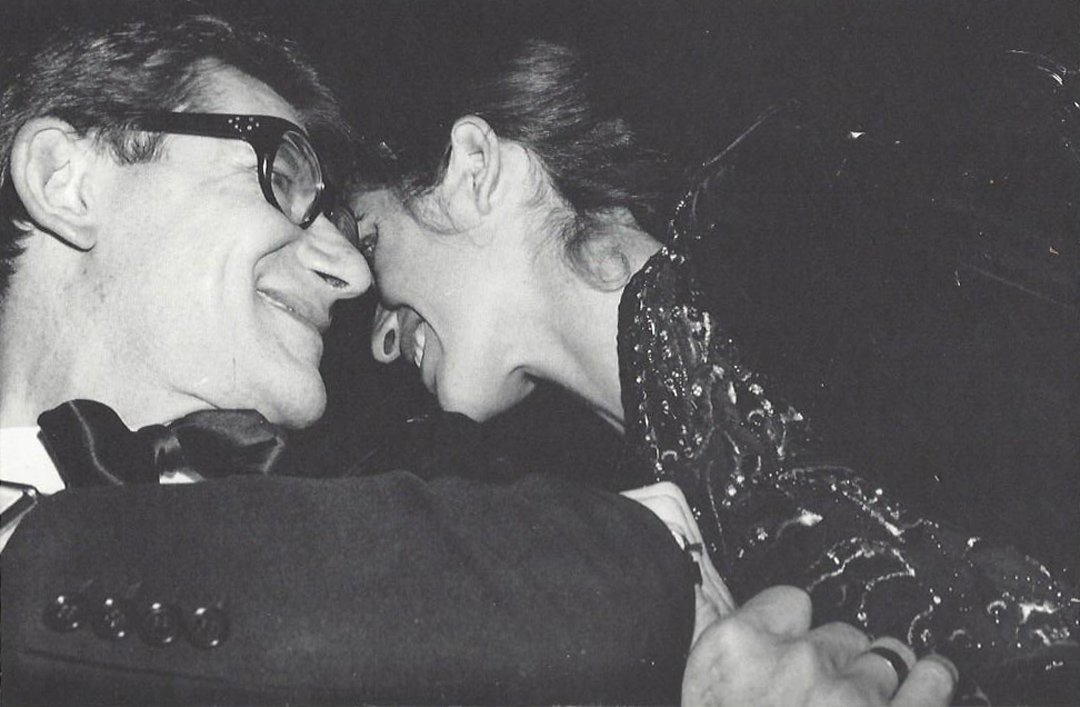 Yves St. Laurent and Woman.: Yves St. Laurent and Woman. Half-tone print. Unsigned. Medium: Half-tone print. Measurements: 6 7/16 x 9 3/4