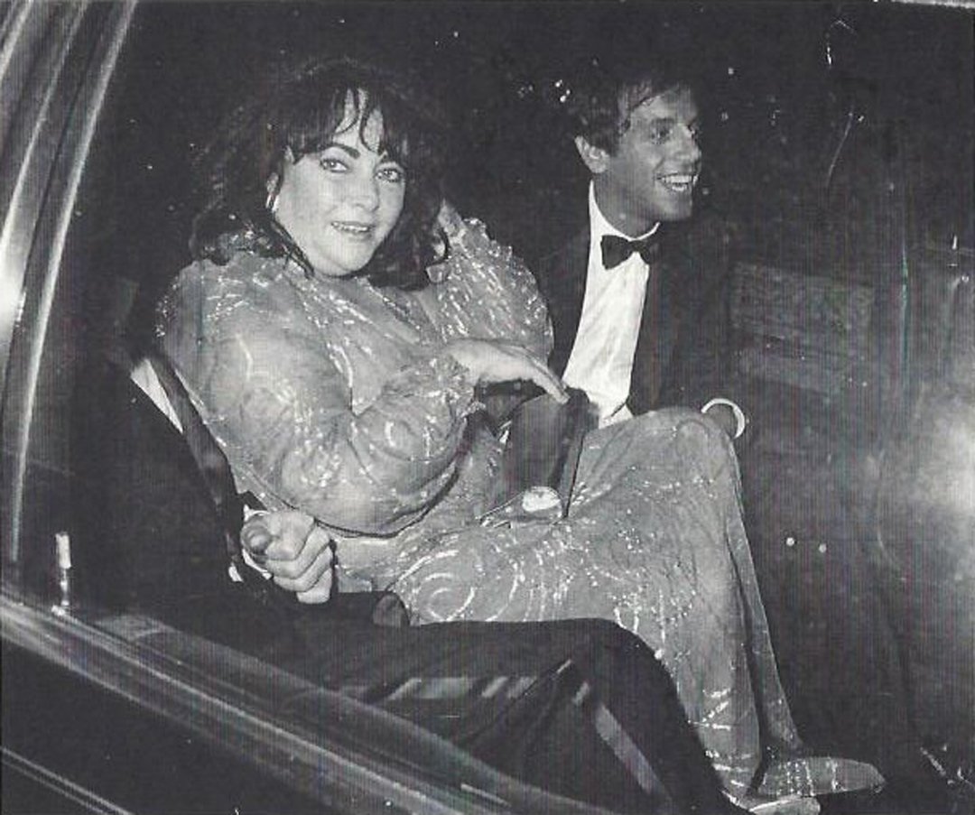 Elizabeth Taylor and Steve Rubell.: Elizabeth Taylor between Steve Rubell and another man in black tie sitting in limo. Mounted on board. Half-tone print. Unsigned. Medium: Half-tone print. Measurements: 5 1/8 x 6 1/8