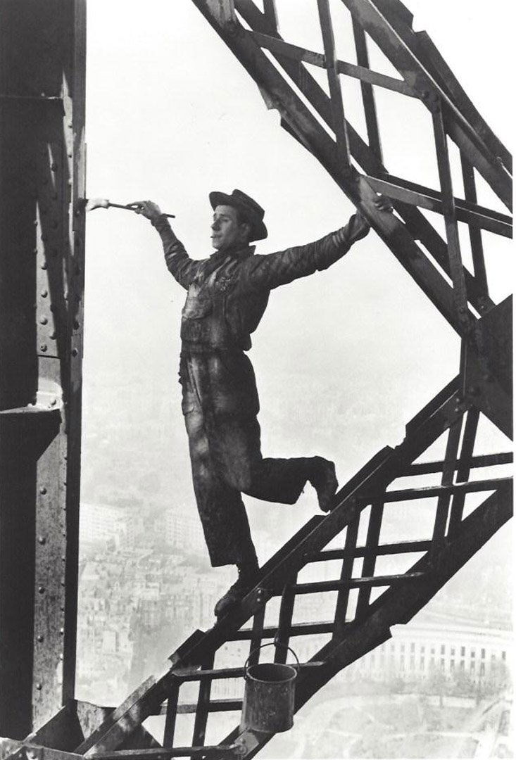 Marc Riboud, Eiffel Tower Painter, 1953: MARC RIBOUD (b. 1923), Eiffel Tower Painter, 1953. Photographic print. Press print. Unsigned. Exhibition label: photo l.a. VI Stephen Cohen Gallery Photographer: Marc Ribound. Medium: Photographic pri