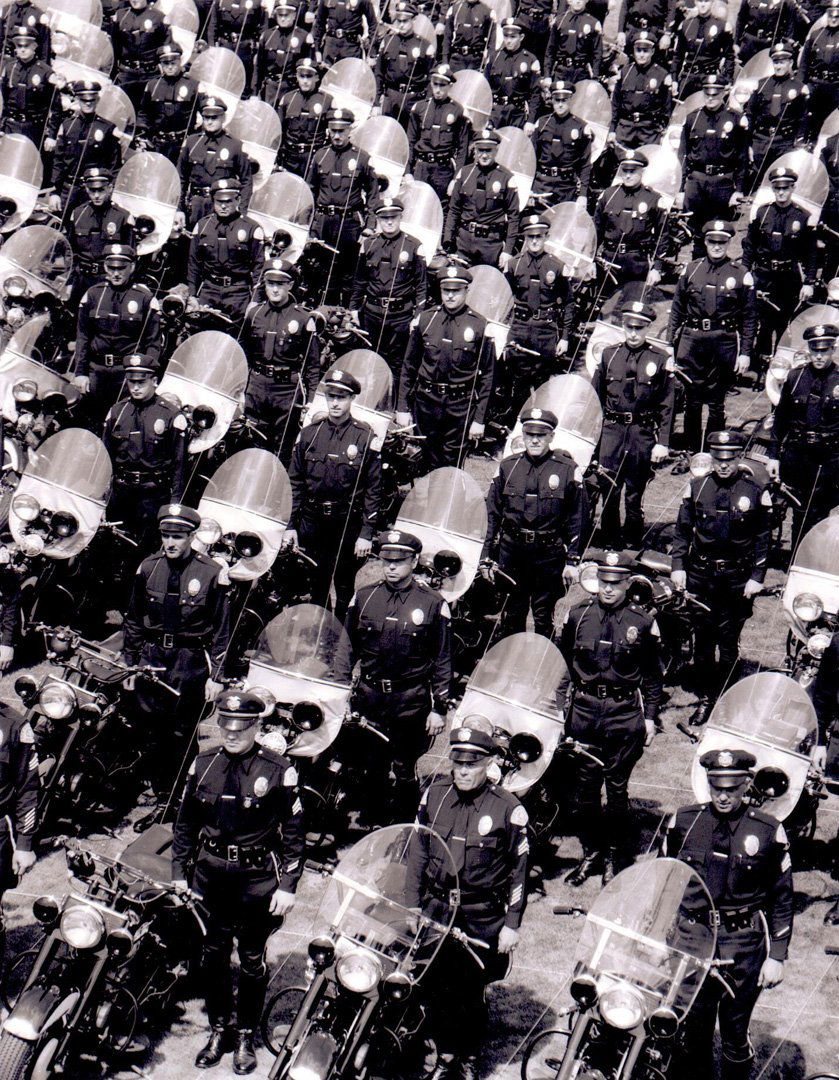 Loomis Dean, Motorcycle Police Los Angeles, 1949.: LOOMIS DEAN (1917 - 2005). Motorcycle Police Los Angeles, 1949. Photographic print. Press print. Unsigned. Exhibition label: Apex Fine Art. Loomis Dean: American Original. Photographer: Loomis Dean. M