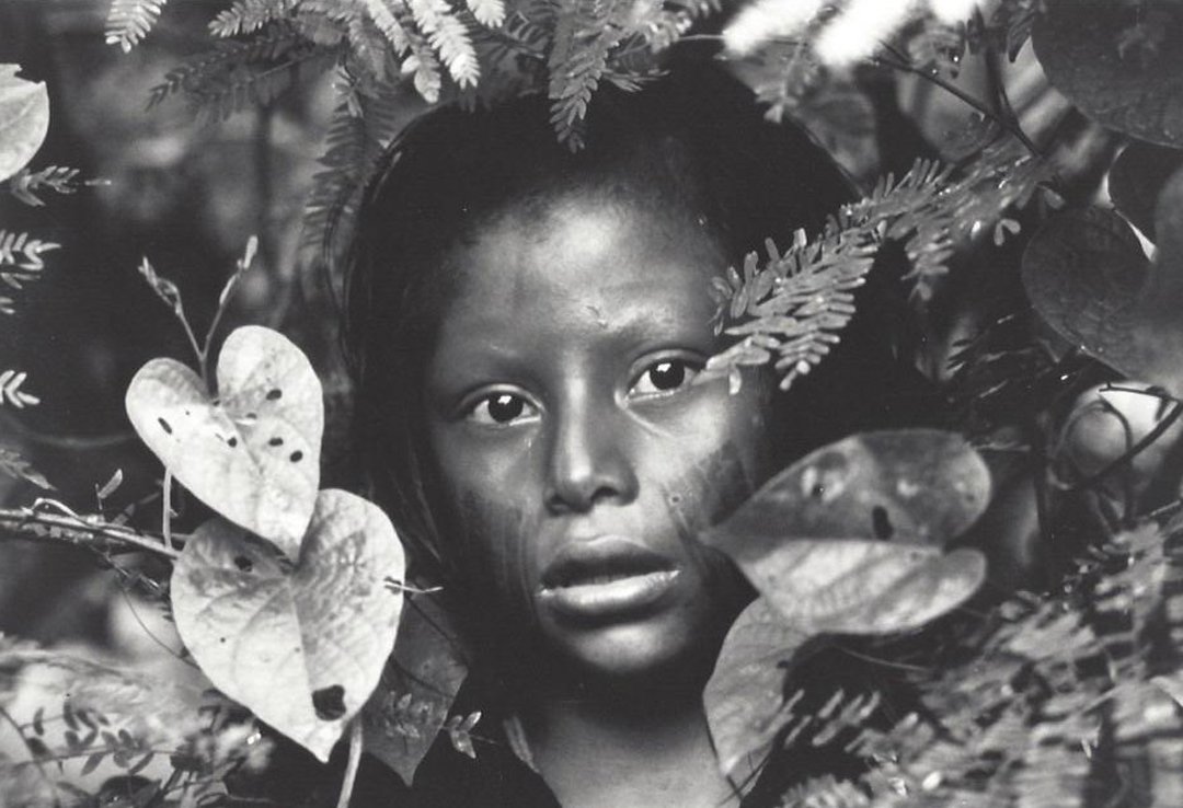 Kayapo Indian of The Brazilian Rain Forest: Black and white still from "Baraka" of a Kayapo Indian of the Brazilian rain forest. Shot in 70 mm. Medium: Silver print. Measurements: 8 x 10