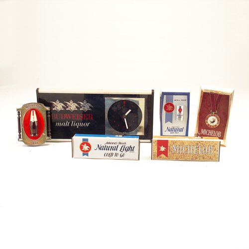Six vintage ANHEUSER-BUSCH promotional signs: BUDW: Six vintage ANHEUSER-BUSCH promotional signs: BUDWEISER lighted clock, working; MICHELOB,lighted, as is; NATURAL LIGHT lighted, working. Largest 16 1/2" x 36"