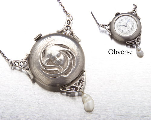 Art Nouveau silver and dentil pearl lavalier watch,