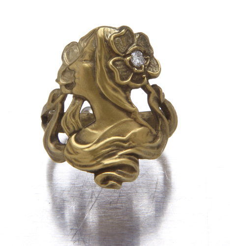 Ring in the figure of a woman with flowers, 14K yel