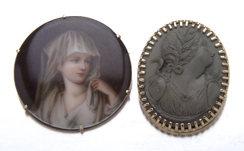 Two gold brooches: mid-Victorian lava cameo portra