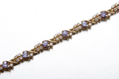 14K yellow gold, diamond and tanzanite link bracel