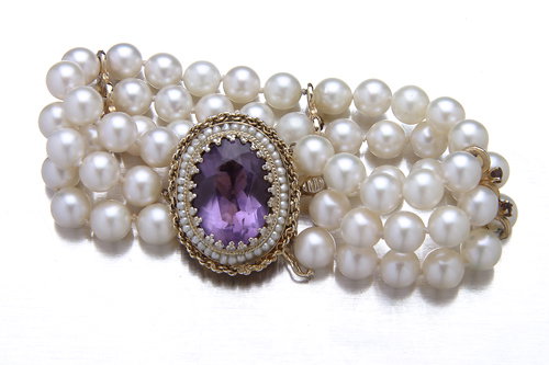 Elegant three-strand akoya pearl bracelet with 14K