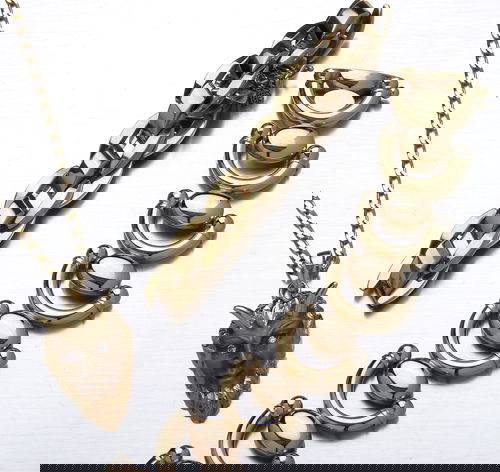 Gold jewelry: 14K yellow gold satyr pendant with d: Gold jewelry: 14K yellow gold satyr pendant with diamond eyes, approx. .06 ct TW, 18K chain; two 14K yellow gold link bracelets, 7" and 8"24"; 18K rose gold curblink chain, 25" 48 g