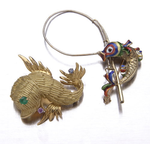 Gold fish brooches: an 18K yellow gold brooch with