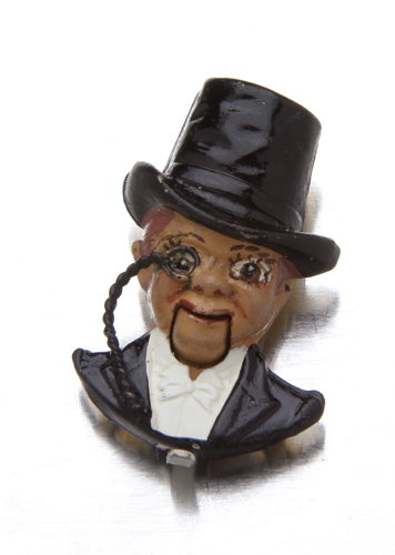 Charlie McCarthy articulated pin, c. 1940, enamel