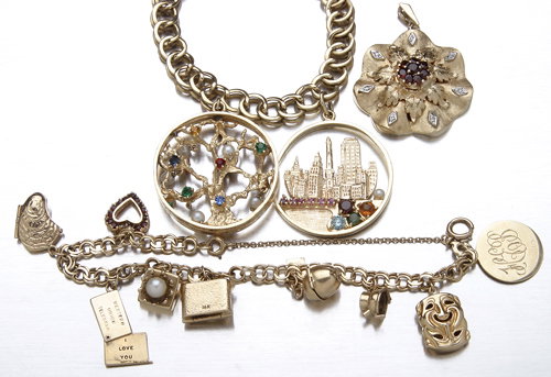 14K charm jewelry twelve charms and two bracelets,
