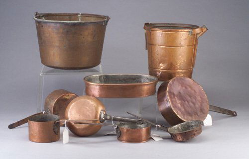 Nine copper utencils - Toledo Cooker Co.: Nine copper utencils - Toledo Cooker Co. vessel, hearth kettle, six pots with wrought handles, and oval roasting pan with riveted handle.