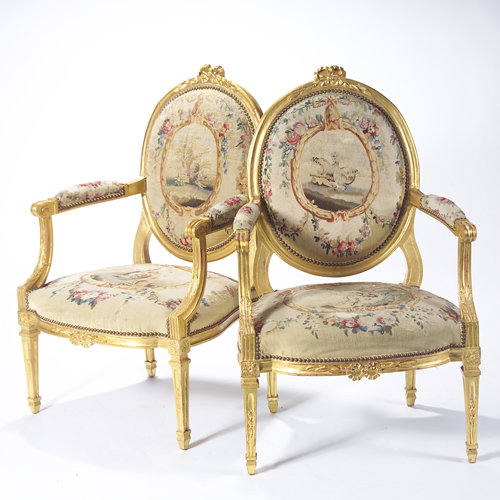 46: Louis XVI style open arm chairs, upholstered in 18t