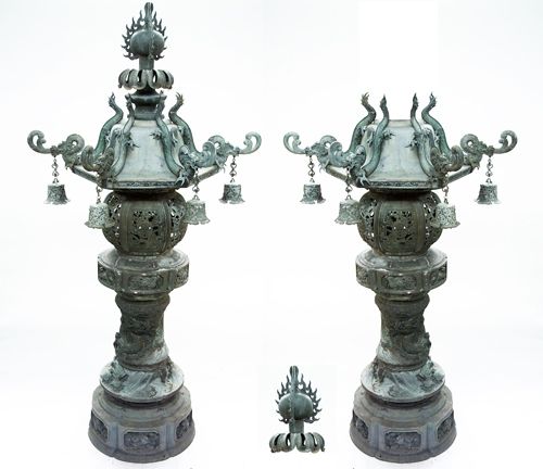 304: Monumental pair of Japanese Meiji Period bronze la: Monumental pair of Japanese Meiji Period bronze lanterns of sectional construction. Each lobed base has six panels with Karashishi and peonies. Above them tortoises crawl on rocks amongst cresting wav