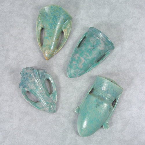 Four ROSEVILLE Carnelian II wall pockets, all in