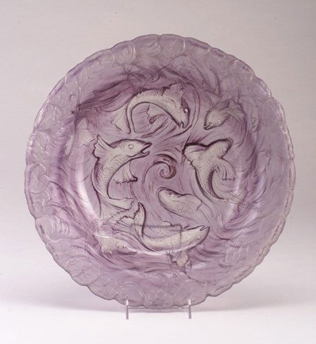 Phoenix glass center bowl, c. 1935, fish: Phoenix glass center bowl, c. 1935, fish design in amethyst glass. 16" dia.