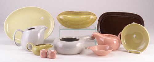 Thirty-one assorted pieces of RUSSEL WRI: Thirty-one assorted pieces of RUSSEL WRIGHT dinnerware consisting of 5 platters, 3 serving bowls, 8 small bowls with handle, 1 medium soup bowl, teapot, coffee pot, casserole, 4 creamers, creamer and