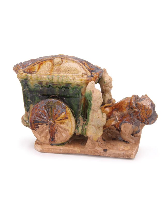 A Liao style sancai glaze model of an ox and cart: L.19cm.