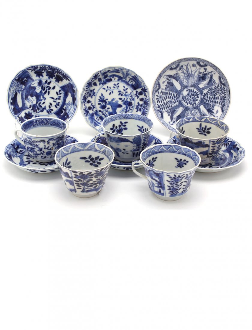 5 Chinese Export Blue & White Cups: One with dragon design, the others with Kraak style design. Together with 6 similar pattern floral rim saucers, mark to base.